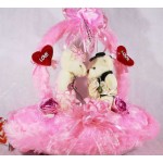 Cute Valentine Kissing Teddy Couple Bears on a Pink Handle Heart
